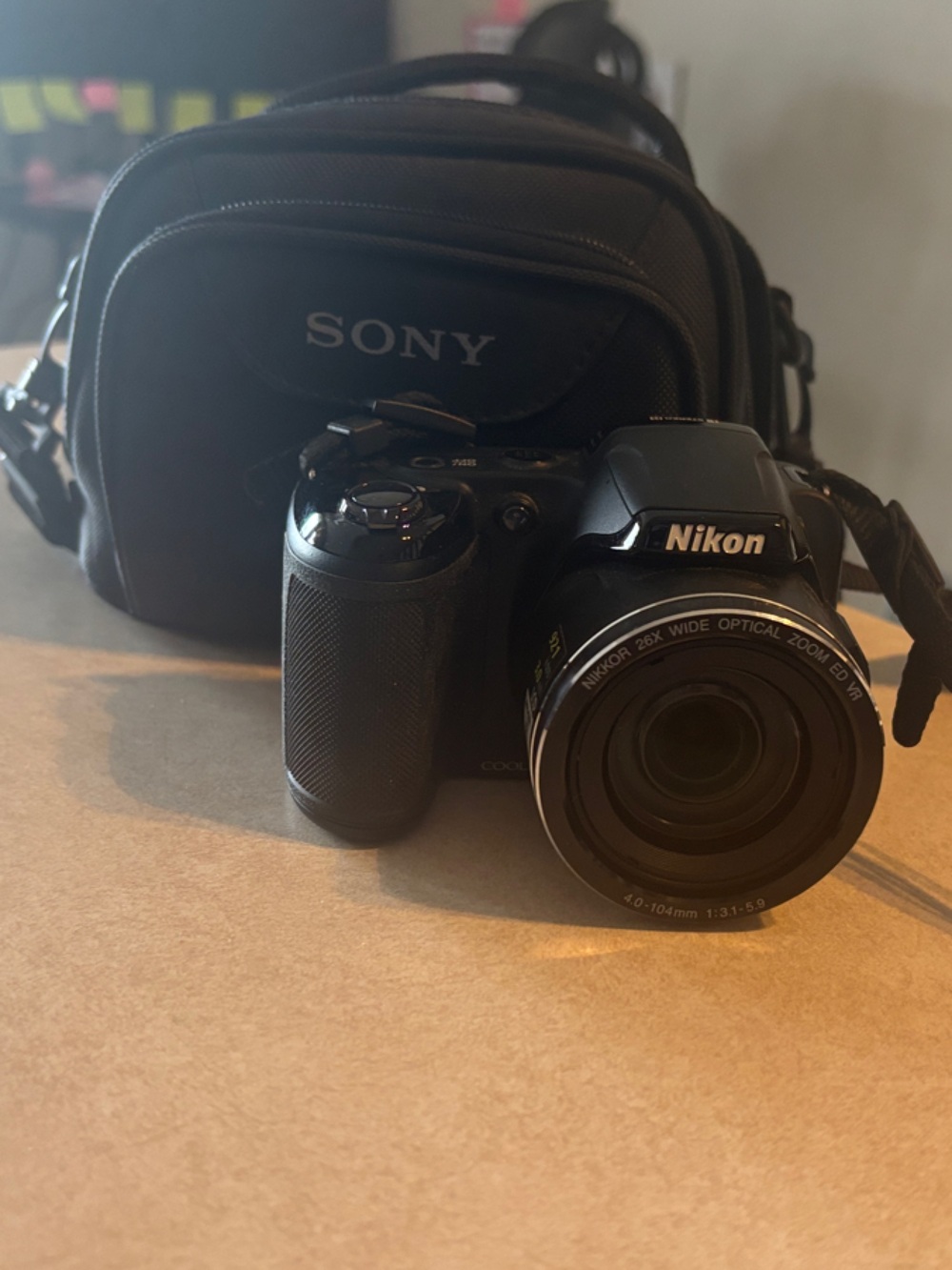 Nikon Black Compact Camera with Lens Cap and Carry Pouch